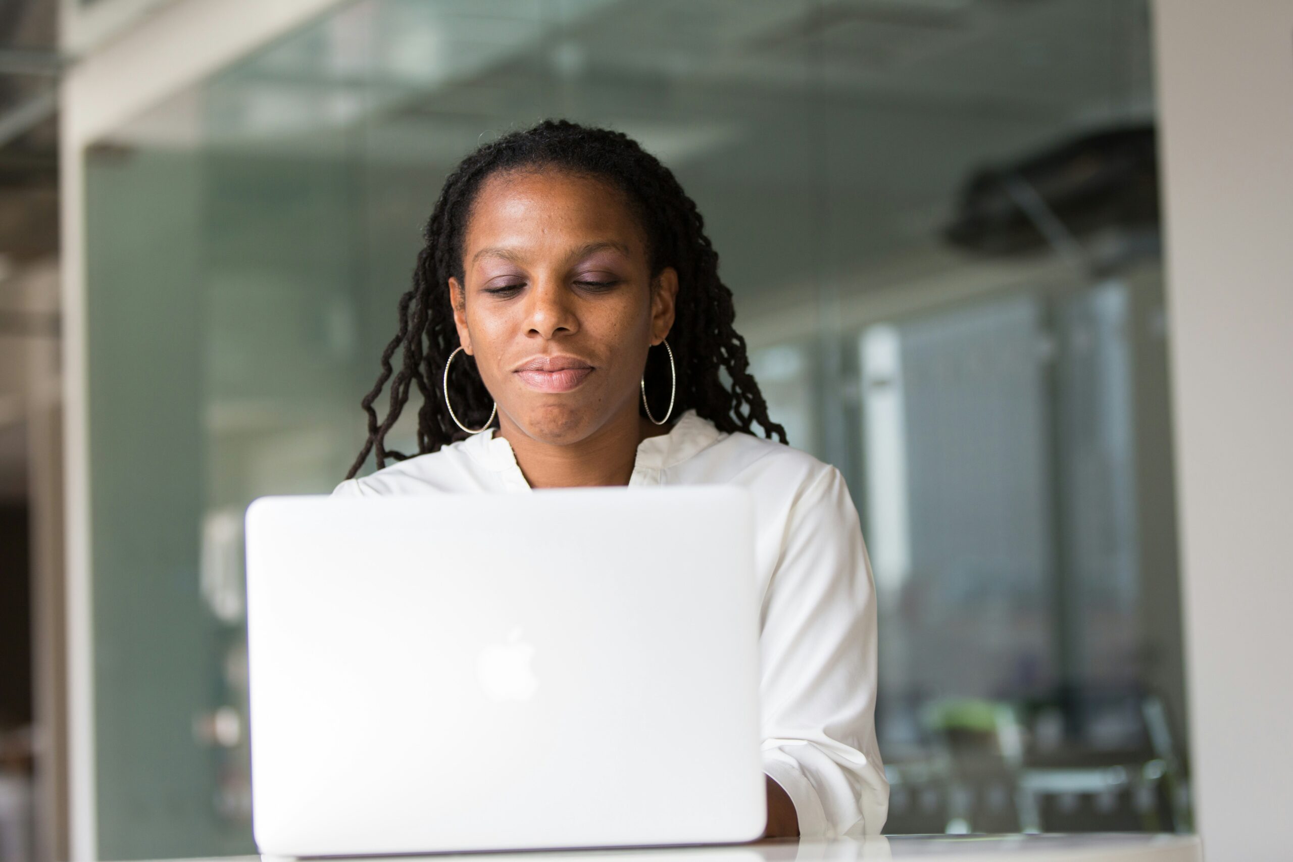 christina-wocintechchat-com-xmjaWQxjvm0-unsplash confident woman at work
